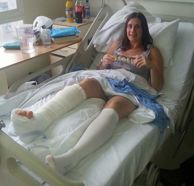 ‘The doctors later told us that if I’d been left until later that afternoon when Stephen (husband) usually returns home, I would have been dead,’ said Sharon (pictured in hospital after surgery)